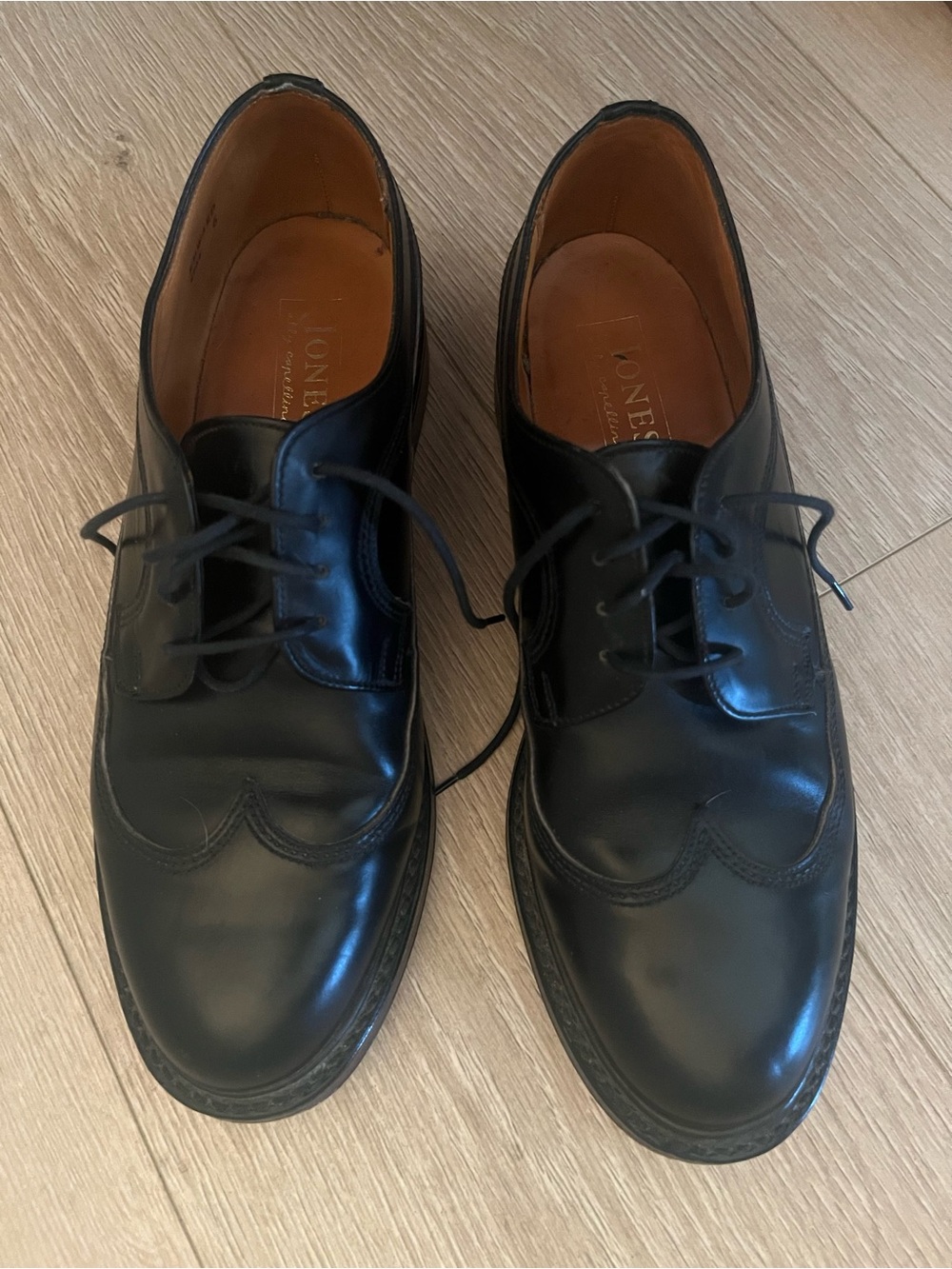 Black Leather Wingtip Lace-Up Flats